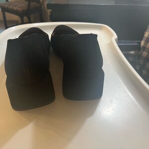 2 pair women’s size 11 black shoes.